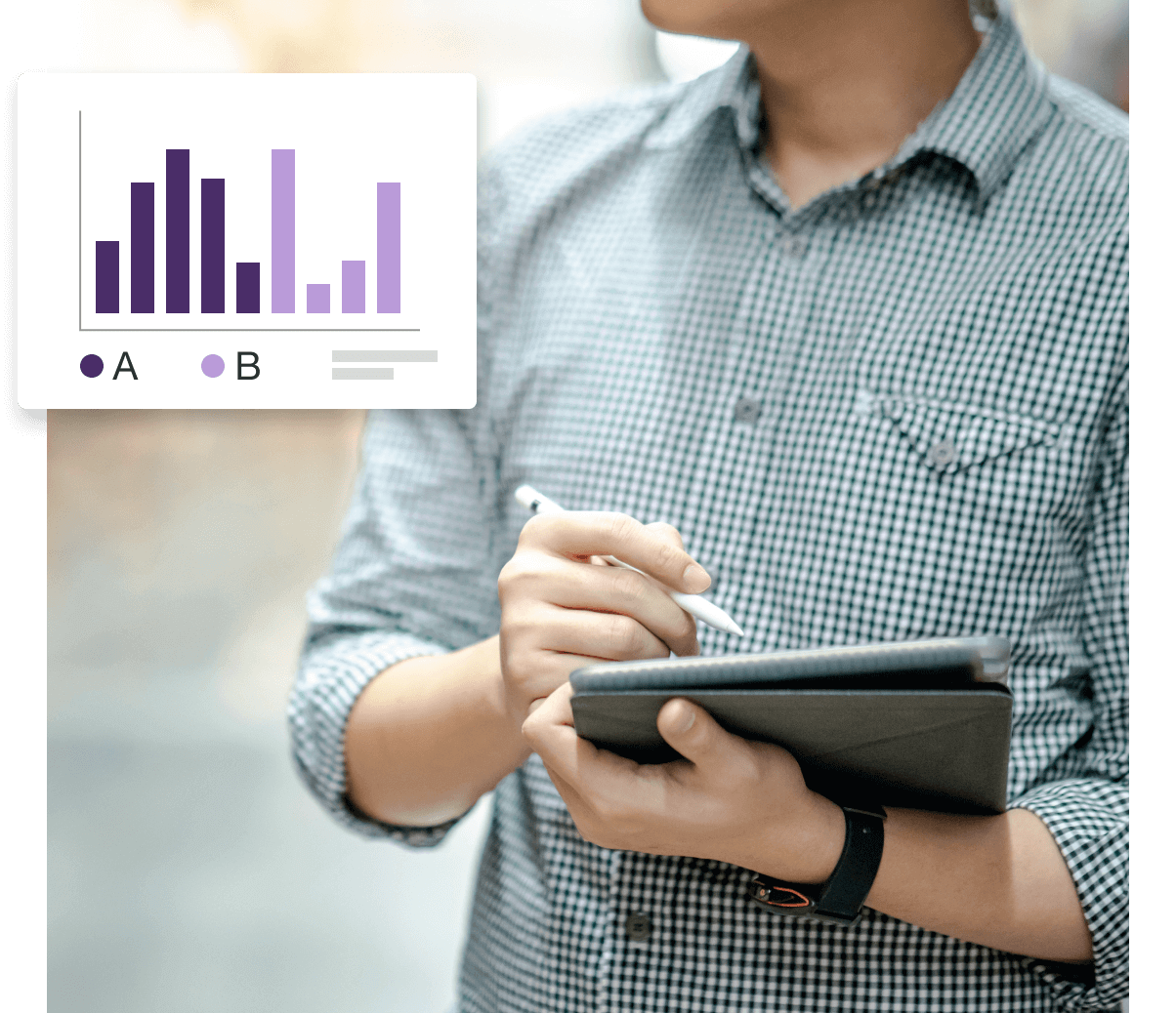 A man holding a tablet with a bar graph on it.