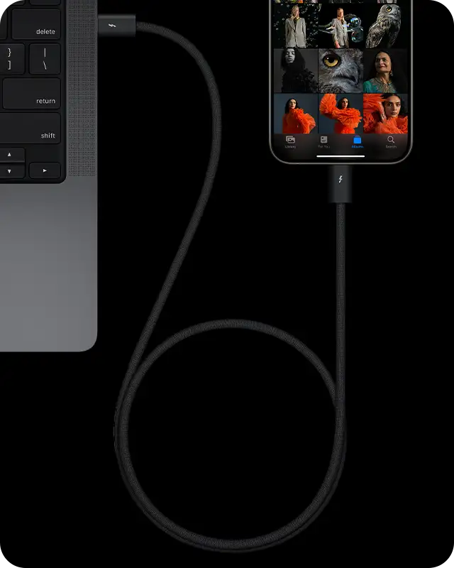 Phone 15 Pro Max connected to MacBook Pro 14-inch with USB-C